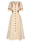 Robe fleurie brodée en coton beige à col en V des années 40