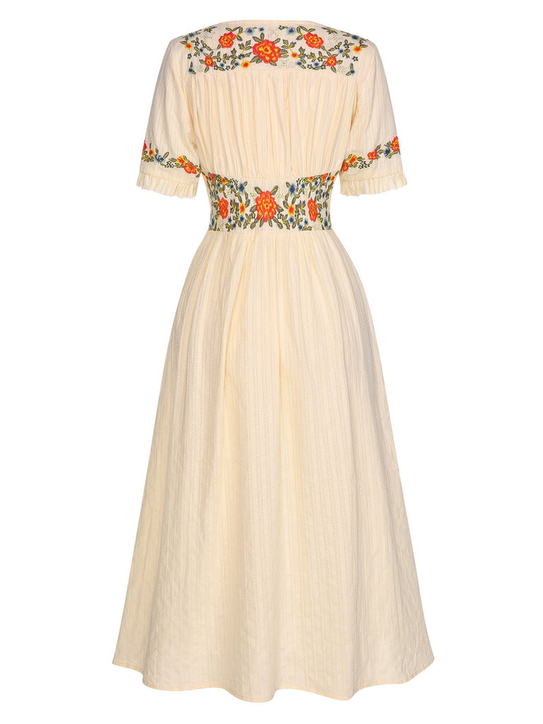 Robe fleurie brodée en coton noire à col en V des années 40