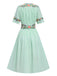 Robe fleurie brodée en coton noire à col en V des années 40