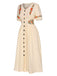 Robe fleurie brodée en coton noire à col en V des années 40