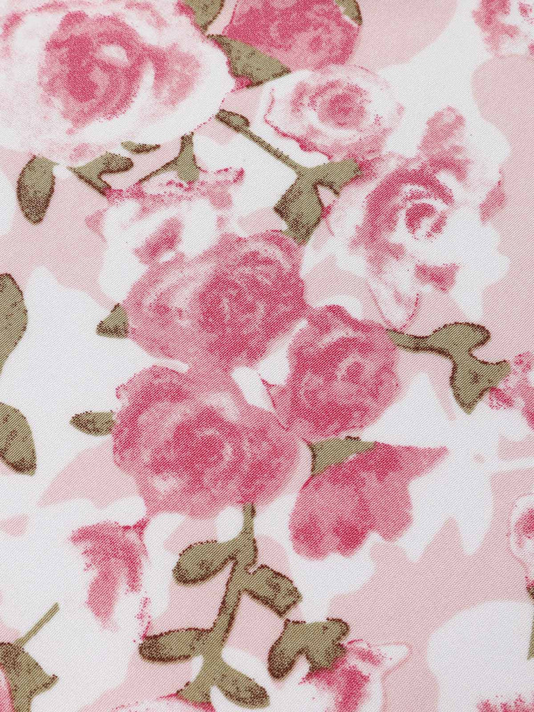 Robe orange à col en V et motif fleurs des années 1950