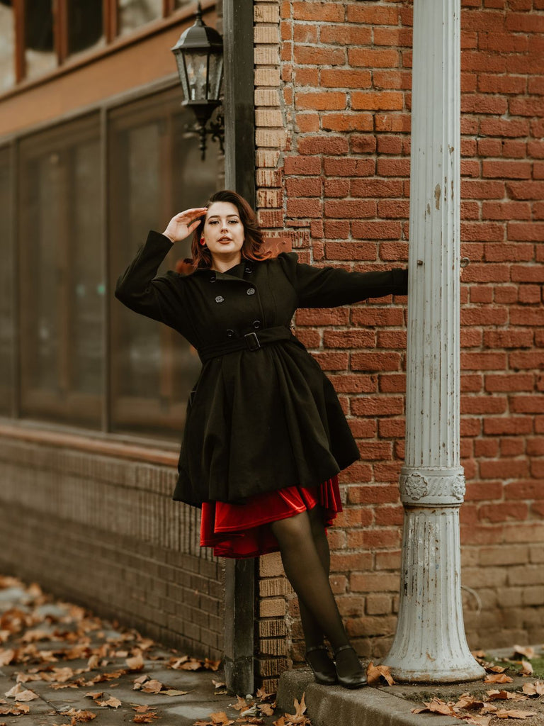 Manteau noir slim à revers couleur unie des années 1950