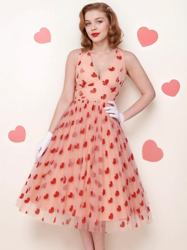 Robe en maille cœur rose à col licou des années 1950