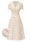 Robe beige à manches bouffantes et revers fleuris des années 1940