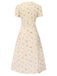 Robe beige à manches bouffantes et revers fleuris des années 1940