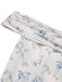 Robe bleue à volants et épaules dénudées motif floral des années 1930