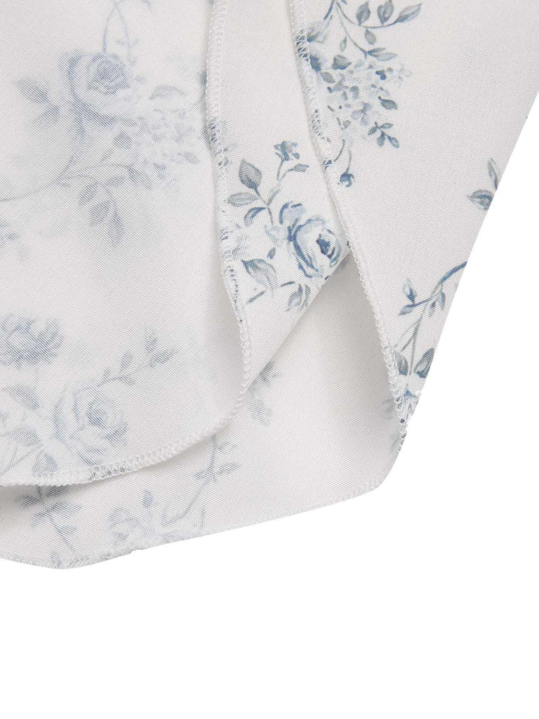 Robe bleue à volants et épaules dénudées motif floral des années 1930