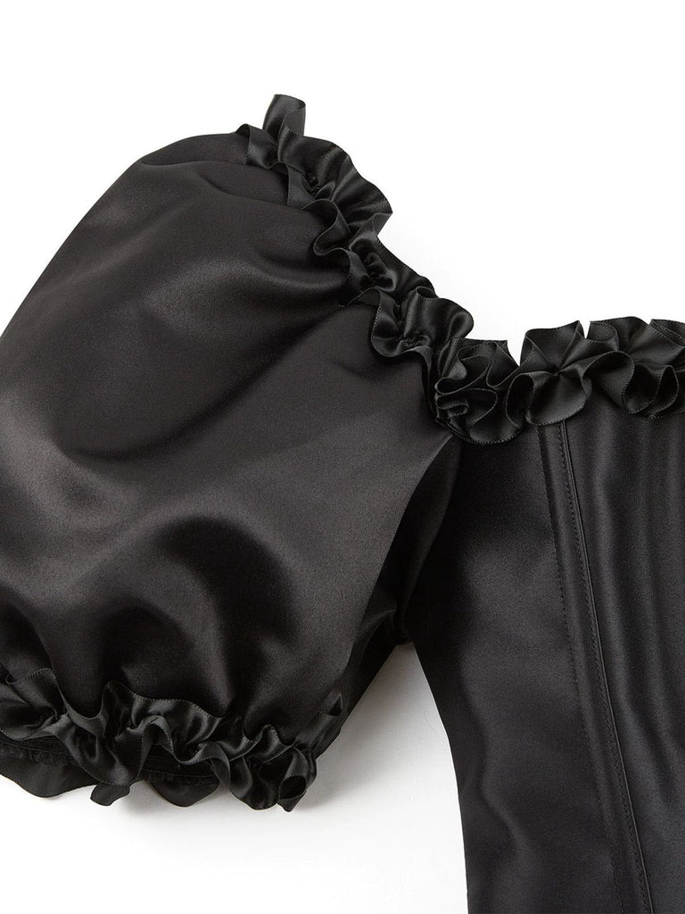 Haut corset noire gothique à manches bouffantes années 1980