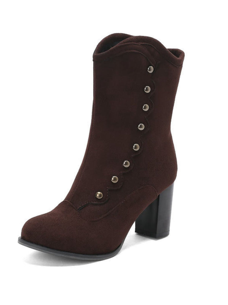 Bottes mi-mollet cloutées en daim doublées de fausse fourrure
