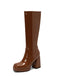 Bottes à talons hauts solides en cuir verni à bout rond