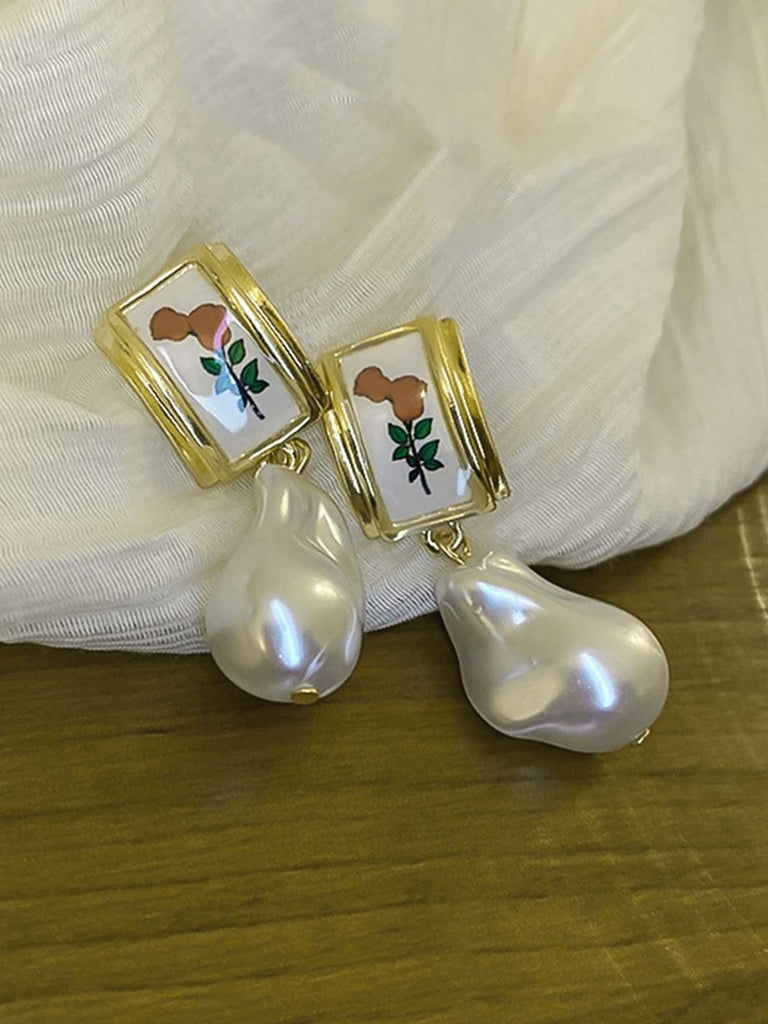 Boucles d'oreilles pendentif en perle rose baroque