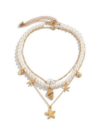 Collier chaîne superposée en perles coquillages et étoiles de mer
