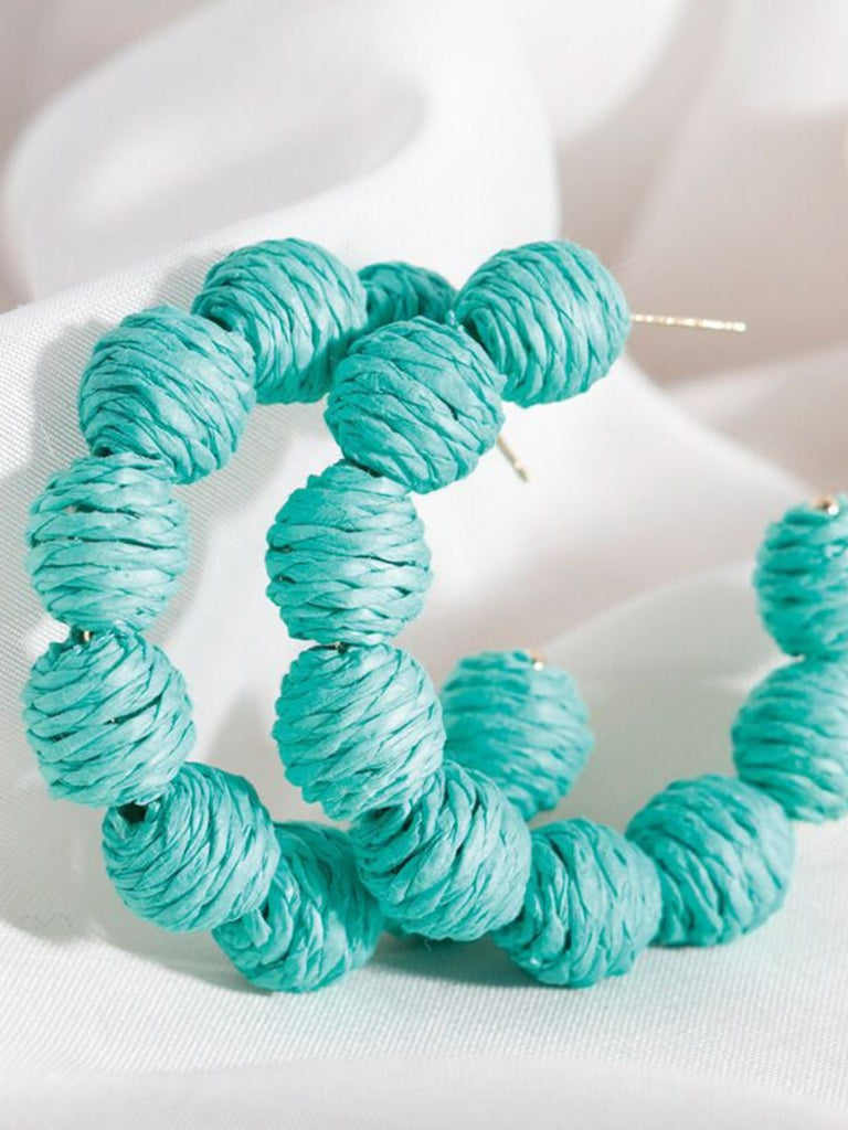 Boucles d'oreilles créoles en raphia tressé épais