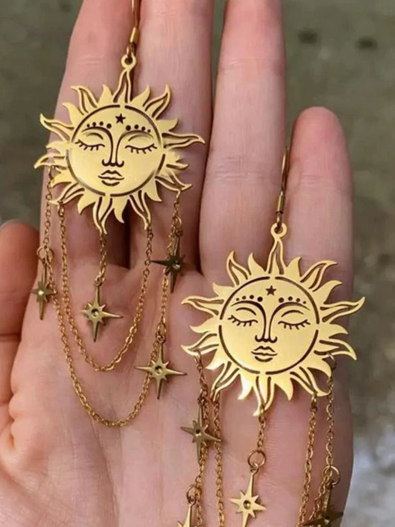 Boucles d'oreilles dorée visage de soleil de tarot avec chaîne