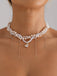 Collier de perles avec pendentif en forme de cœur blanc et strass