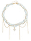 Collier de perles avec pendentif en forme de cœur blanc et strass