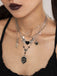 Collier gothique noir à plusieurs niveaux avec cœur ailes étoile et épée