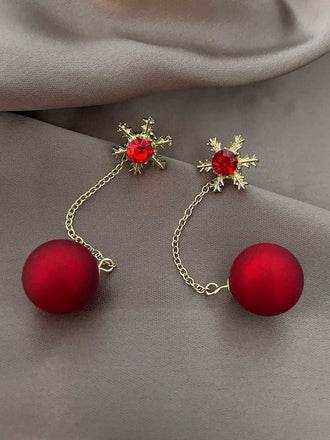 Boucles d'oreilles flocons de neige et boules de Noël rouges