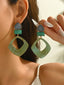 Boucles d'oreilles vintage en résine marbrée à motif géométrique exagéré