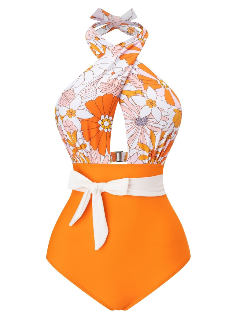 Maillot de bain fleuri orange à bretelles croisées nœud papillon années 1950