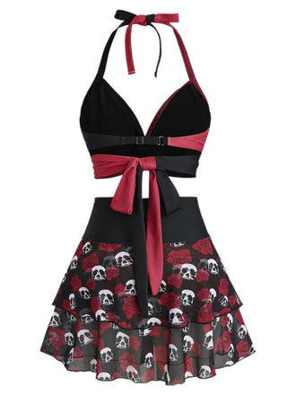 Maillot de bain jupe dos nu noir et rouge motif tête de mort et roses années 1980