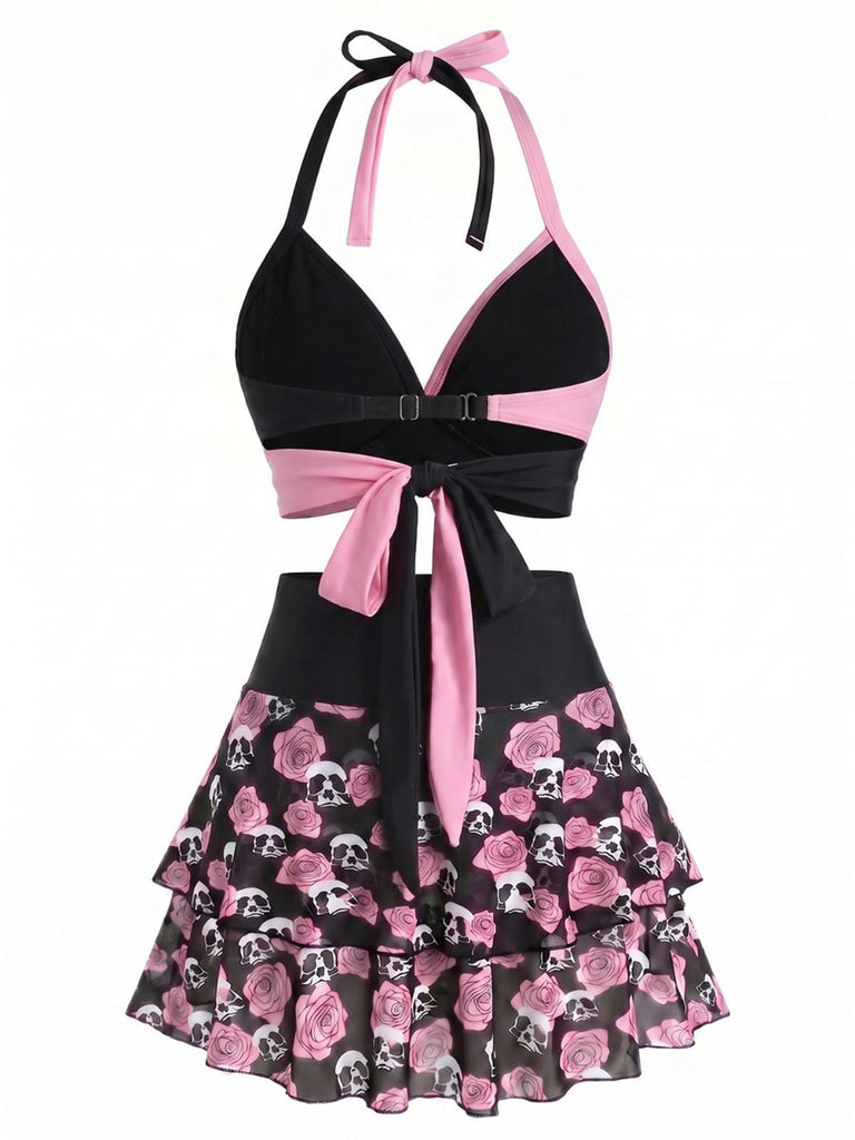 Maillot de bain jupe dos nu noir et rouge motif tête de mort et roses années 1980