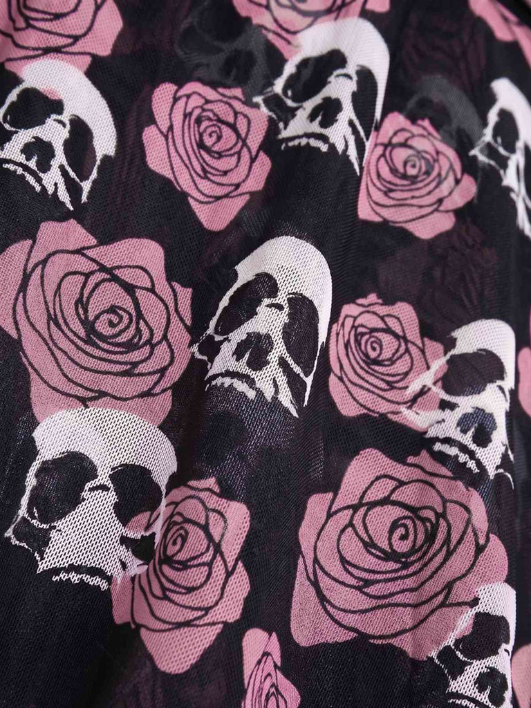 Maillot de bain jupe dos nu noir et rouge motif tête de mort et roses années 1980