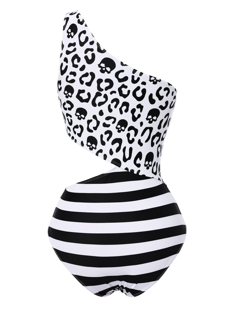 Maillot de bain noir à rayures et tête de mort une épaule ajourée années 80