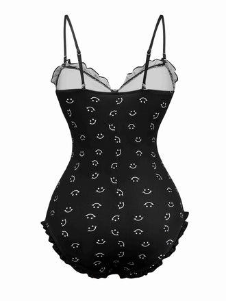 Maillot de bain une pièce noir à volants et bretelles imprimé sourire années 1930