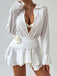 Mini-robe cache-maillot blanche col V profond motif floral 3D années 1950