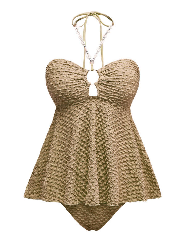 Maillot de bain dos nu à lacets et chaîne coquillages des années 1940