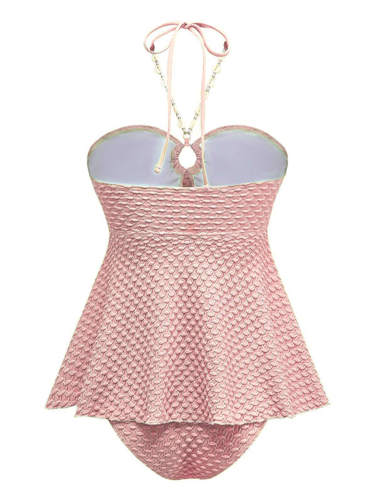 Maillot de bain dos nu à lacets et chaîne coquillages des années 1940