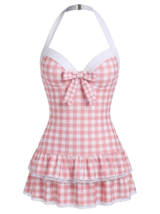 Maillot de bain une pièce bleu clair à pois et nœud des années 1940