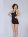 Maillot de bain dos nu noir uni des années 1950