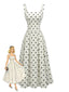 Robe blanche sans manches pois encolure carrée et jupe plissée années 50
