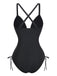 Rear view of the black one-piece swimsuit highlighting the elegant cross-back strap design and full coverage bottom.