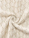 Macro view of the intricate knit pattern and breathable fabric texture of the crochet beach dress.