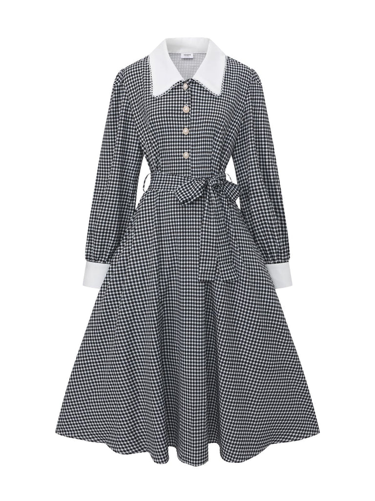 Robe noire à manches bouffantes et boutons nacrés style pied-de-poule années 1940