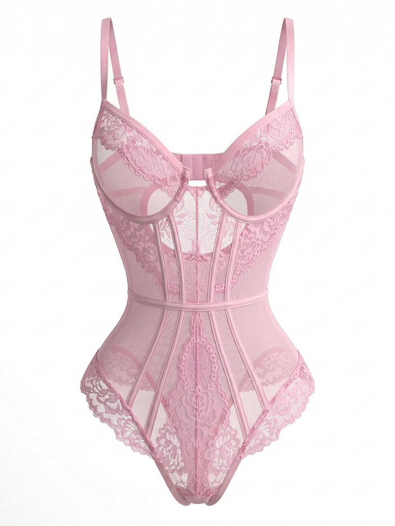 Front studio shot of the pink lace bodysuit highlighting the intricate floral embroidery and cut-out details at the bust.