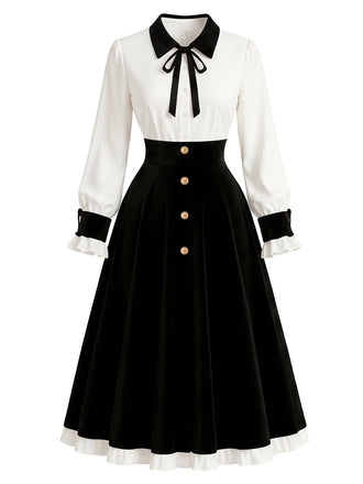 [Prévente] Robe noire et blanche à nœud contrastant, boutons et manches lanternes Années 1950 - 2