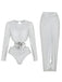 Flat lay view of the silver shimmer bodysuit and the matching high-waisted long skirt laid out separately.